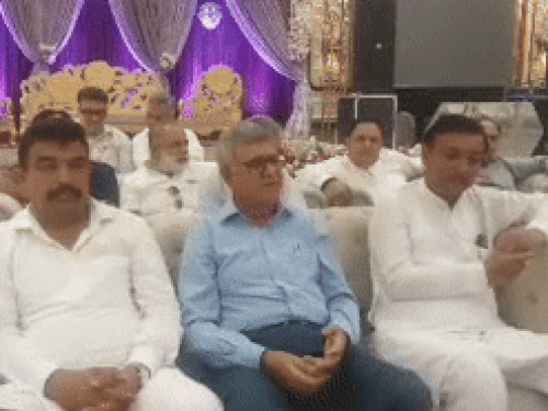 Kuldeep KD (left) and Balwan Ranga (right), sitting with the MLA in the press conference.