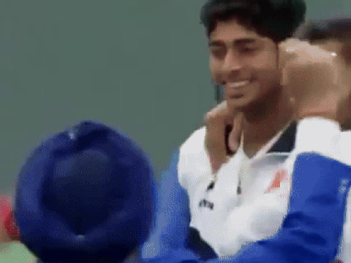डेविस कप जीत के बाद खुशी मनाते भारतीय और सुमित नांगल।