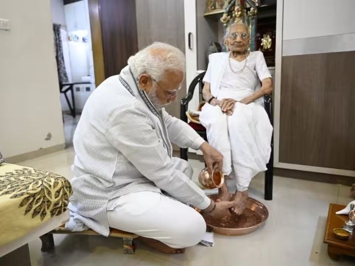 Prime Minister washing mother's feet on her birthday.- File photo