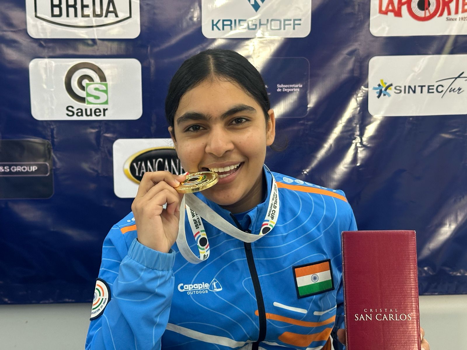 Suruchi Phogat showing gold medal.