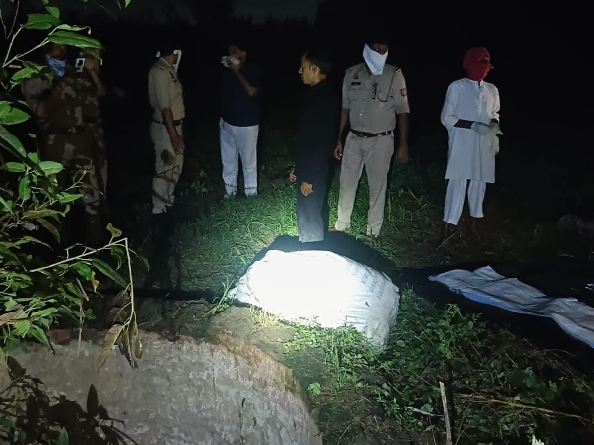 Woman's body wrapped in a sack found in a well