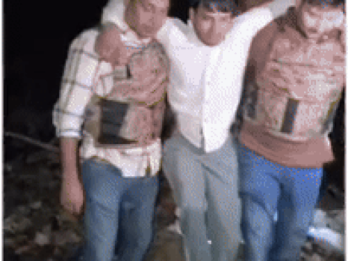 गोली लगने के बाद बदमाश कमल भड़ाना को लेकर जाती पुलिस