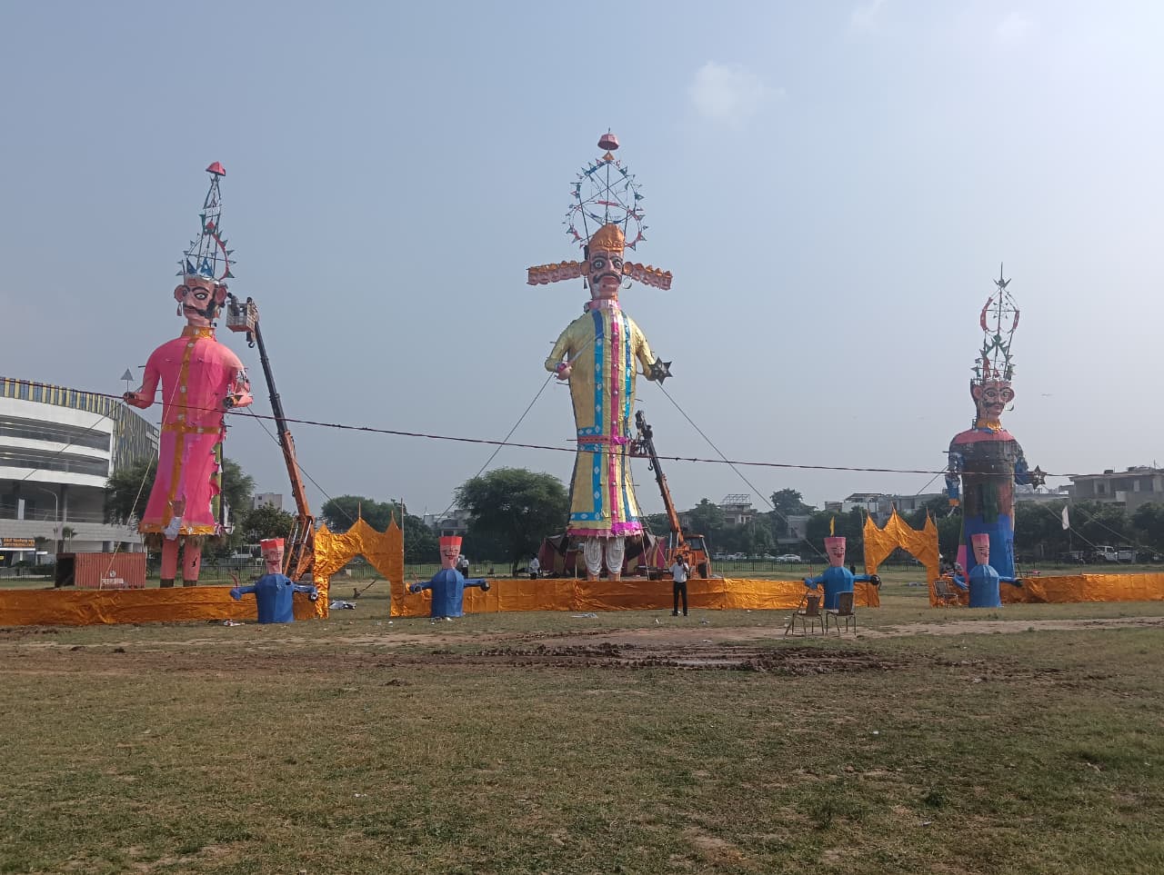 People engaged in preparing for Ravana Dahan in Mohali.