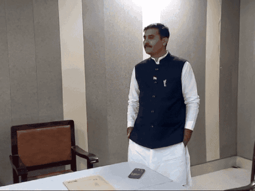 MLA Satpal Jamba standing after not getting a chair in the Zilla Parishad meeting on 22 November 2024.