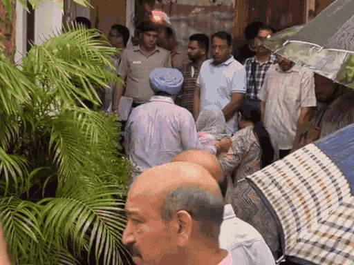 Police officers and people present at Y Puran Kumar's house.