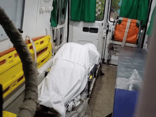 The body of Y Puran Kumar kept in ambulance.