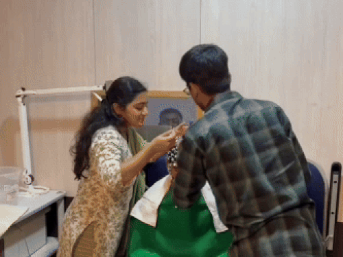 Scientists doing research on Sandeep Arya's body.
