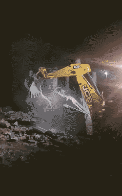 The debris of the house is being removed with JCB.