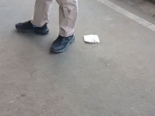 Blood stained bandage fell on the ground in the hospital wards.