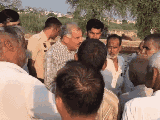 Villagers arguing with the MLA in Tokas Patan village of Nalwa constituency in Hisar.