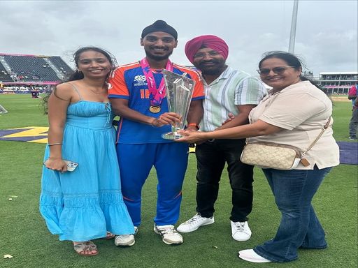 Indian bowler Arshdeep Singh and his family with the trophy after winning the T20 World Cup held in America last year.