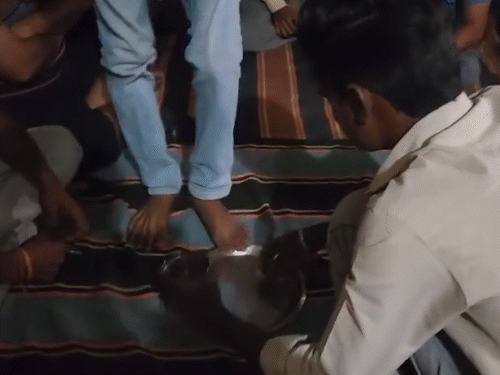 A video of the young man washing his feet has also surfaced.