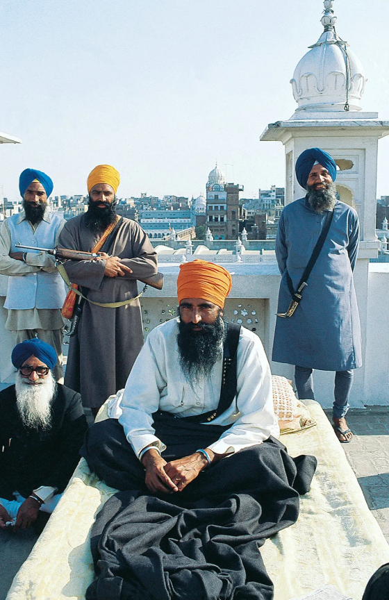General Singh Bhindranwale (centre) with his armed men at Guru Nanak Niwas in Amritsar on 1 January 1983.