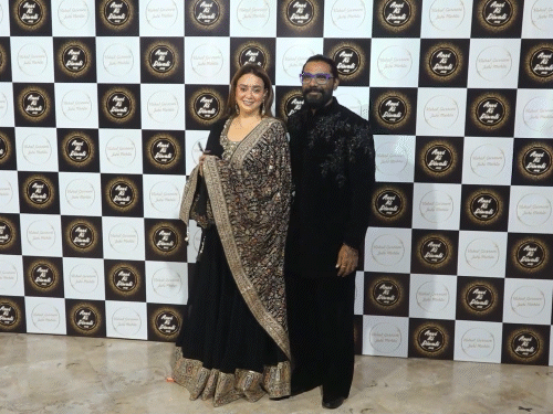 Remo D’Souza and wife in traditional outfits.