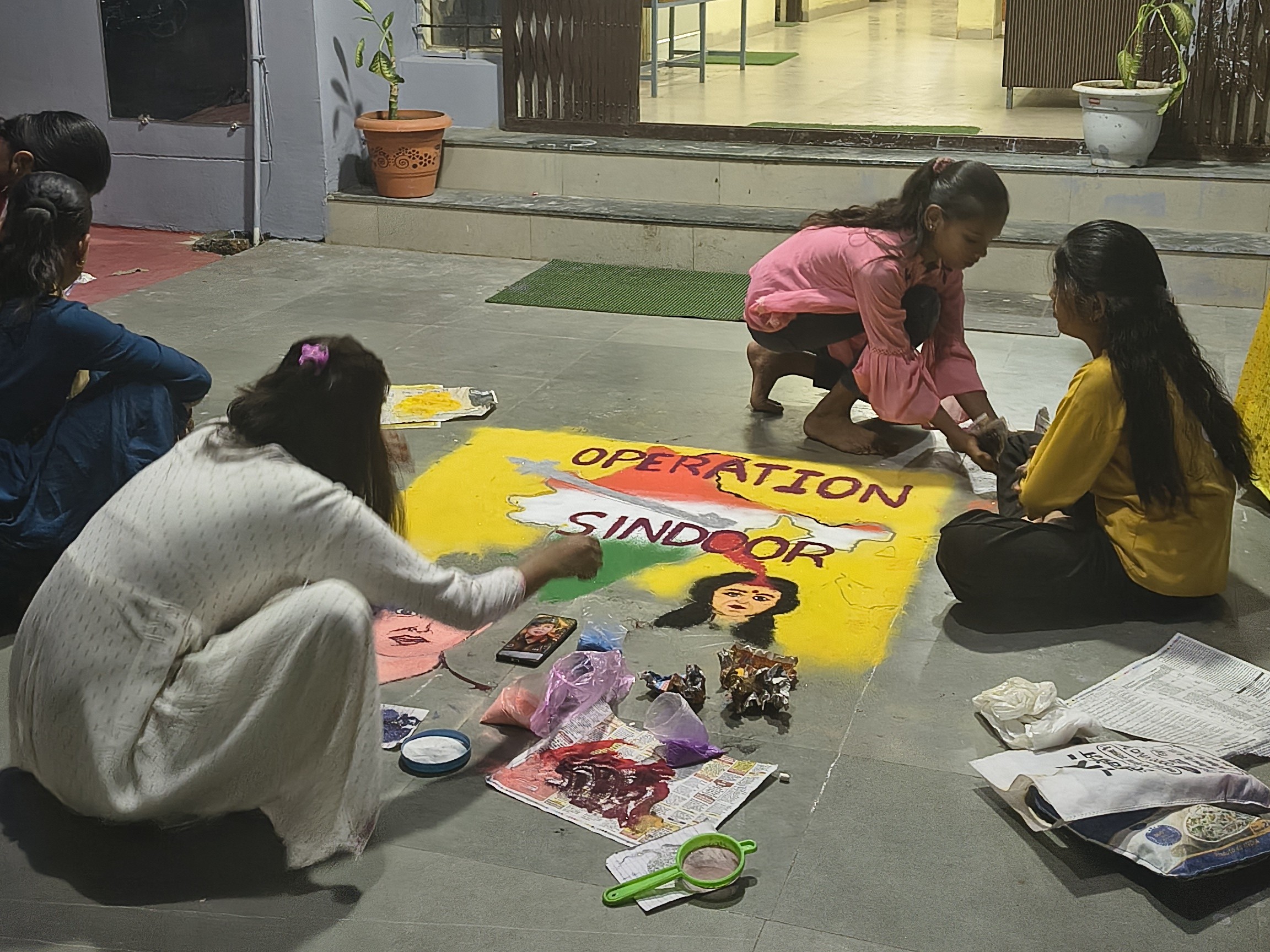 Operation Rangoli Children made rangoli on Operation Sindoor at the city police station.