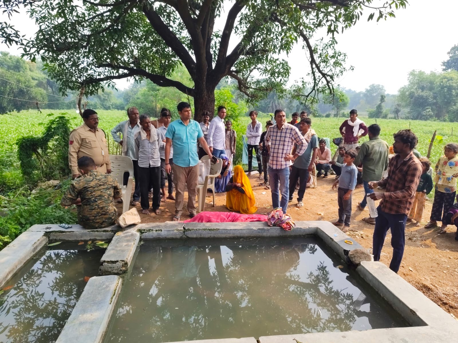 The body of a newly married woman was found in a field pond.