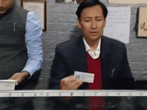 Commissioner Deepak checking the documents after reaching CSC centre.