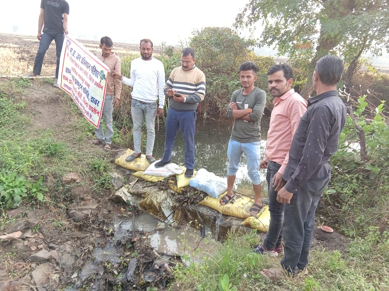 Water Conservation Was Promoted By Tying 26 Sacks On The Drain 