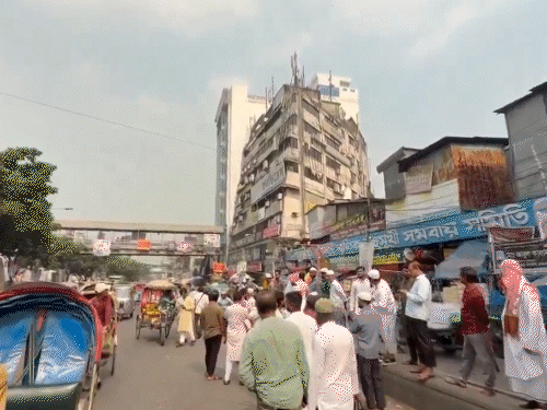 A ten-storey building tilted to the other side due to the earthquake.