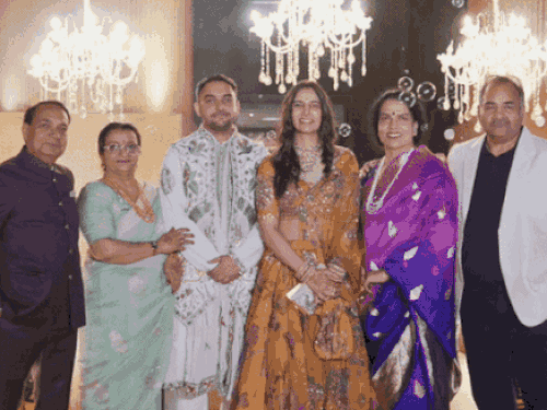 IAS Abhinav Siwach and IPS Aashna Chaudhary with their parents.