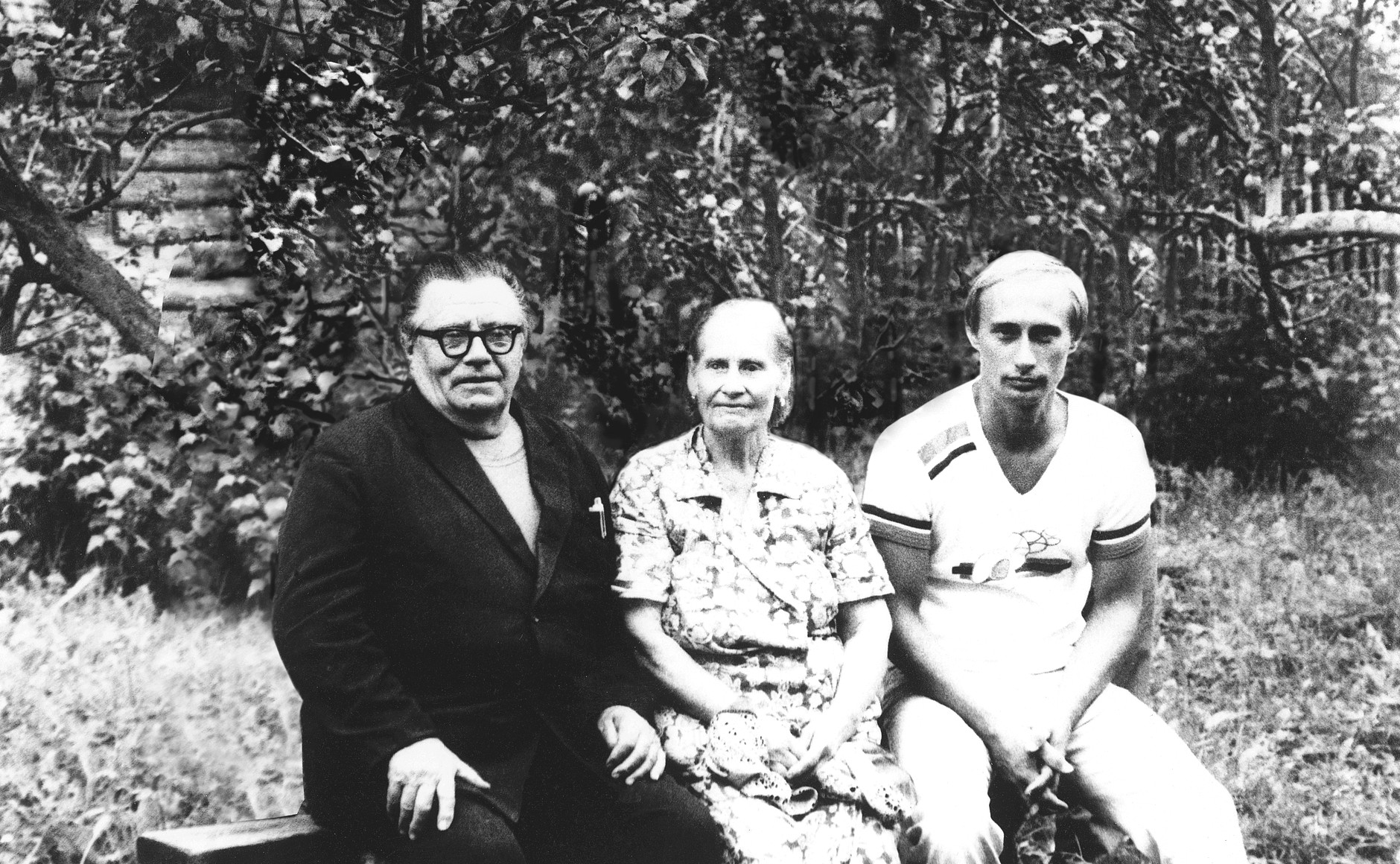 The only picture of Putin with his parents.