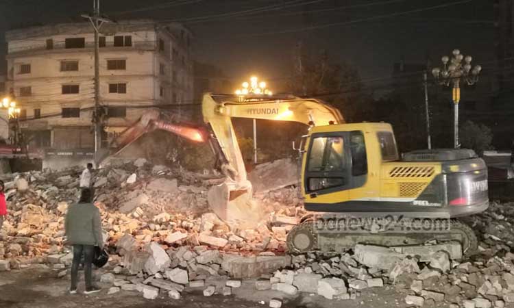 The protesters demolished the office of Sheikh Hasina's party Awami League with bulldozers.