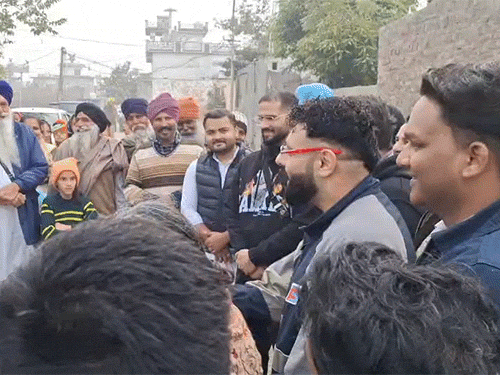 Famous rapper Badshah talking to villagers.