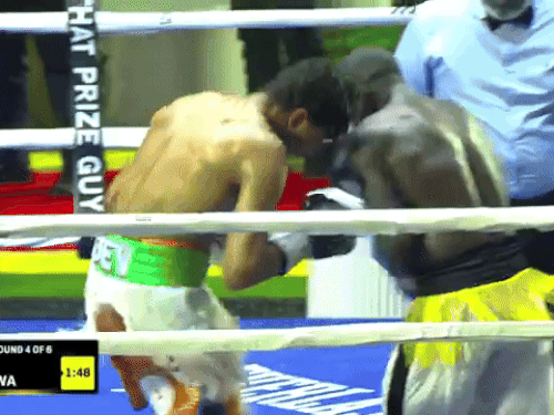 अफ्रीका के स्टेडियम में अपने प्रतिद्वंदी खिलाड़ी को पटखनी देते निशांत देव।