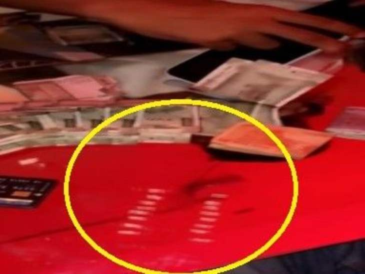 वीडियो में ड्रग्स की 19 लाइन टेबल पर खिंची दिख रही है।