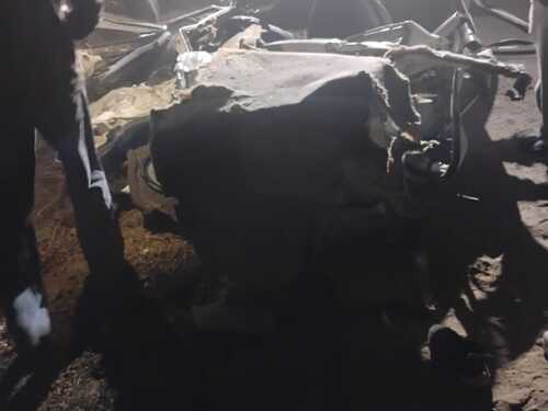 The car was crushed due to truck overturning in Jhajjar.