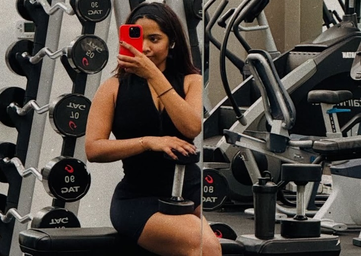 जिम में वेट के साथ सेल्फी लेती निकिता।