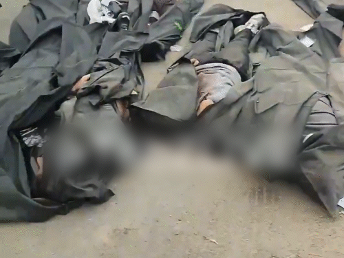 ईरान की राजधानी तेहरान में एक हॉस्पिटल के सामने लोगों की लाशों के ढेर का फुटेज। - Dainik Bhaskar