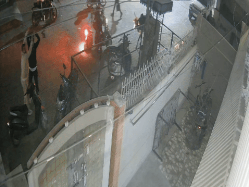 A person snatched the axe from the boy and struck the scooter multiple times.