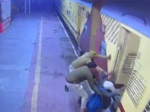 RPF personnel pulled the elderly man out by grabbing his hand.