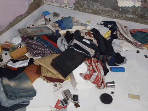 घर में बुरी तरह तोड़फोड़ की सारा सामान इधर-उधर पड़ा।