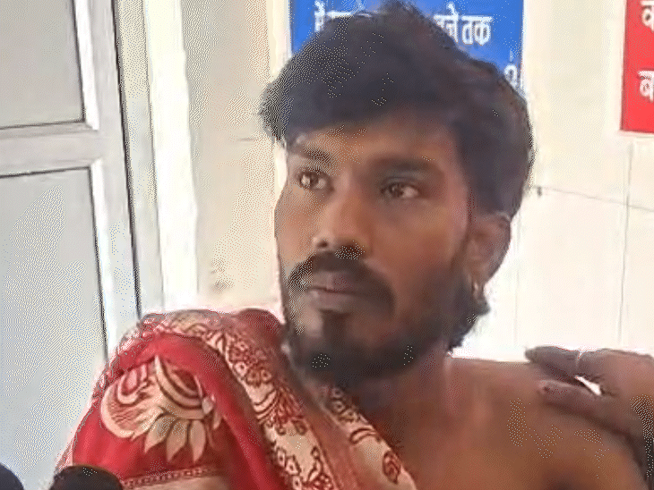 जिला अस्पताल में भर्ती ऑटो चालक अनुज चौधरी।