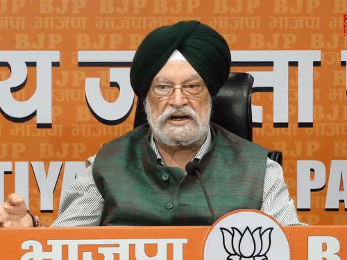 केंद्रीय मंत्री हरदीप सिंह पुरी ने बुधवार को प्रेस कॉन्फ्रेंस कर एपस्टीन के आपराधिक मामलों से अपना कोई संबंध होने के आरोपों को बेबुनियाद बताया। - Dainik Bhaskar