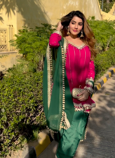 एक वीडियो में अदिति पटियाला सूट में फोटो शूट कराती हुईं।