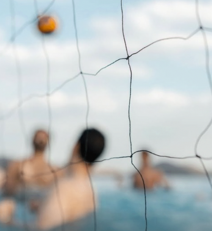 In one photo, Vijay is seen playing volleyball with his friends in the swimming pool.