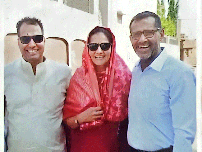 HCS officer Gayatri with her father Rajendra Hooda (right) and husband Pradeep Ahlawat