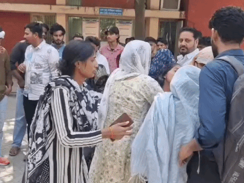 Family members protesting at the hospital regarding the arrest of the accused