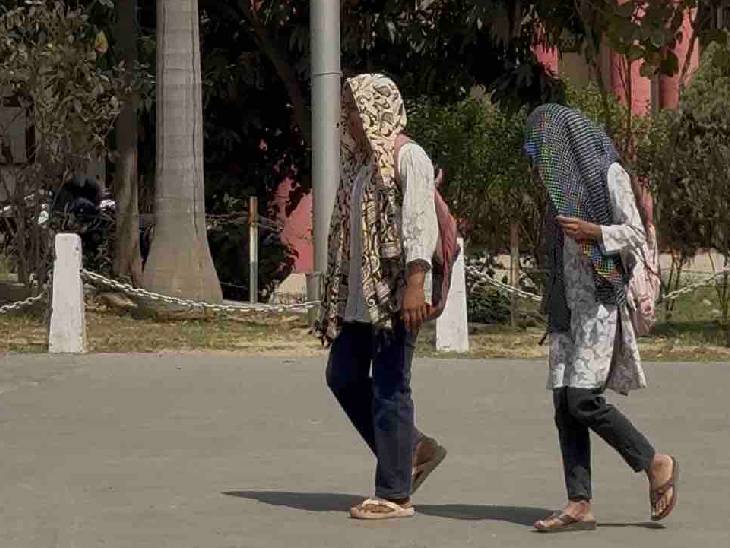 गोरखपुर में मंगलवार सुबह धूपी खिली। इस दौरान युवतियां चेहरे को ढक कर निकलीं।
