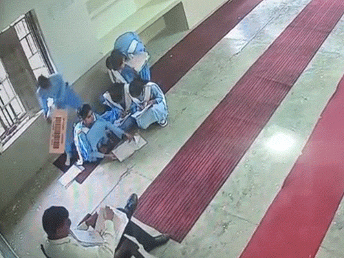 Female students cheating while sitting in a group. This case was caught 15 days ago at Government Girls Senior Secondary School located in Badhda, Charkhi Dadri. (File)