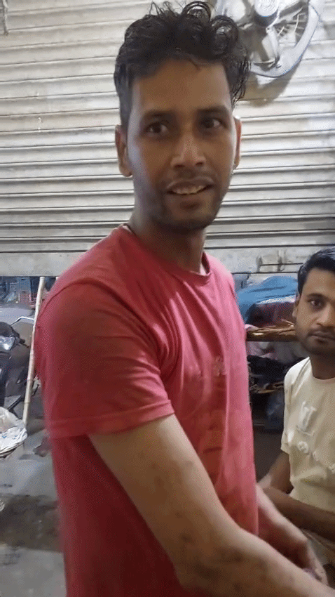 In the Ganesh Nagar area, a young man is buying gas in black and illegally filling small cylinders.