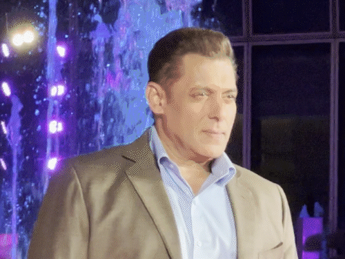 Salman Khan was seen in brown suit. He paired the suit with a light blue shirt.