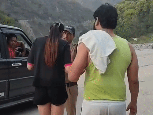 She argued with the police when stopped from drinking alcohol on the banks of the Ganga river.