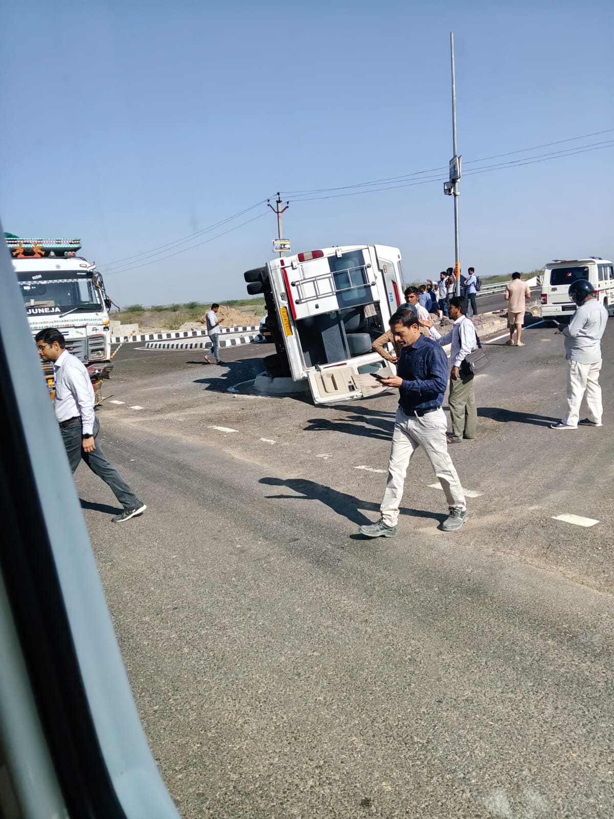 A bus carrying workers lost control and overturned outside the refinery ...
