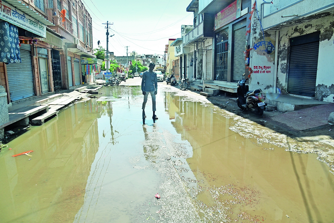 Overflow Zone Contaminated water is spreading in the streets due to sewer overflow in ...