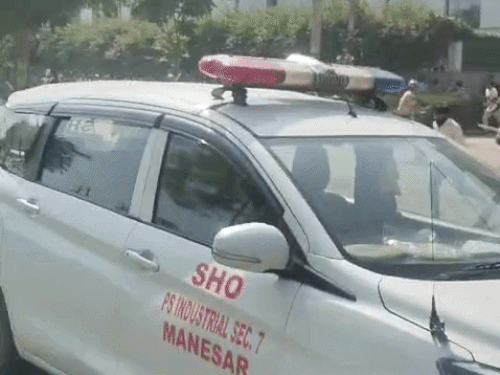Police lathi-charging striking employees sitting outside companies in Manesar.