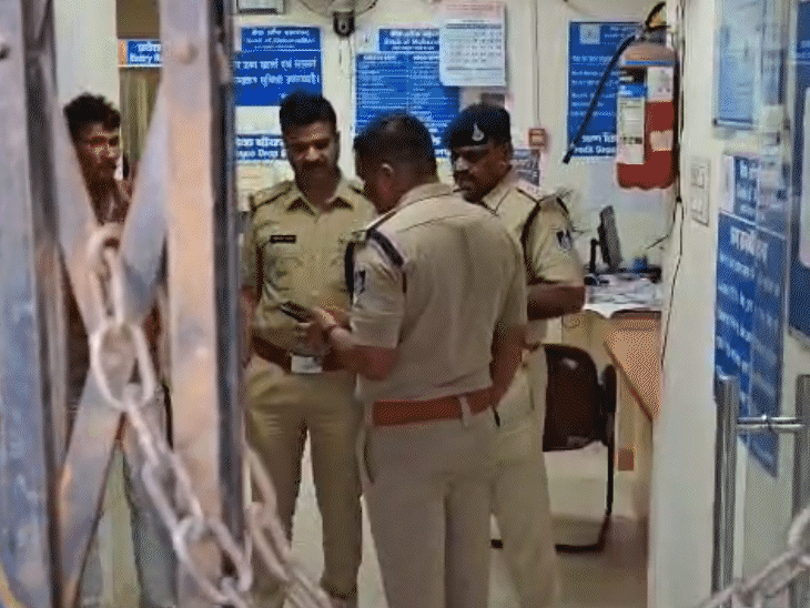 SP and other police officers inspected the bank.